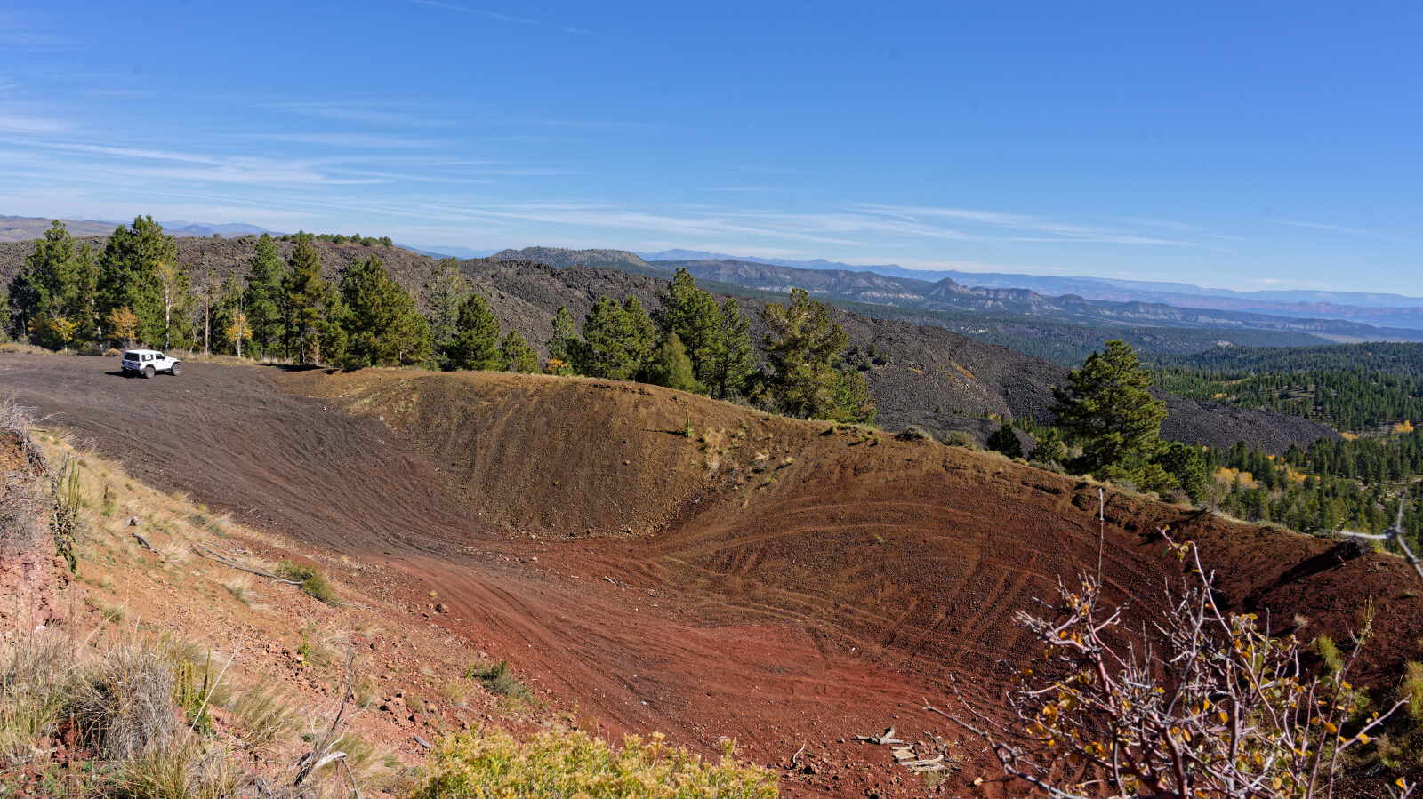 A small play area in gravelly lava rock. The rock is very loose on the hills, so take care going up and down.