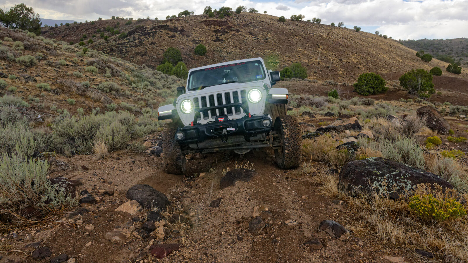 A hard spot with a rock step about 8 to 10 inches high. A second step nearby is about 5 to 6 inches.