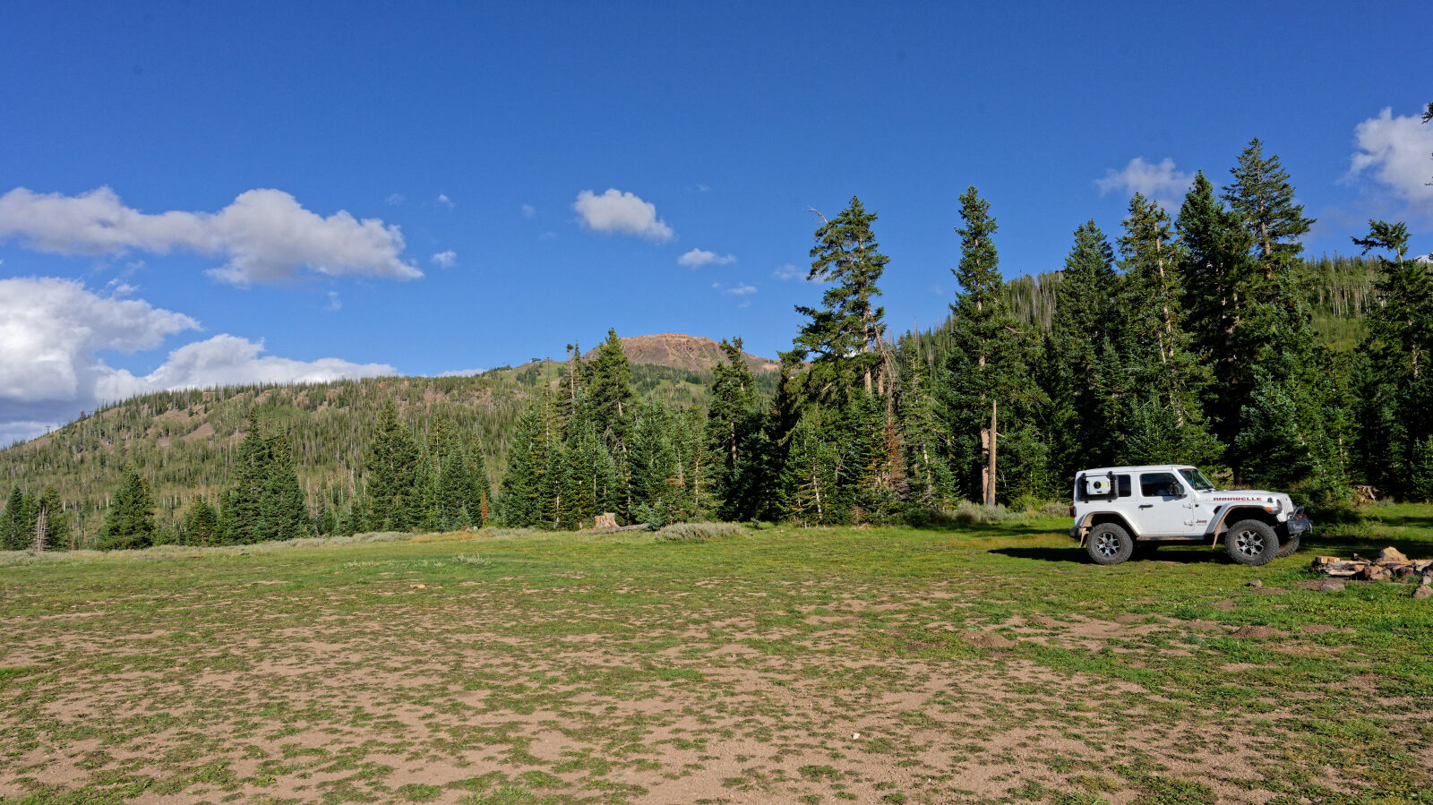 Three campsites here, maybe more, with no shade or privacy. Two can hold group campers. Pit toilets are also here.