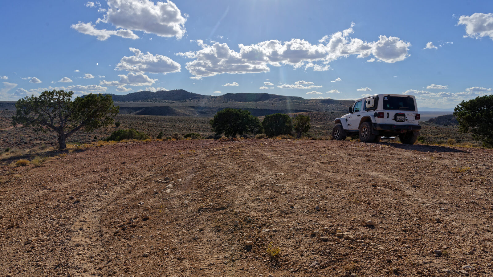 Camping for 2 to 3 rigs, with room for a large trailer. Popular shooting area with no shade and no privacy.