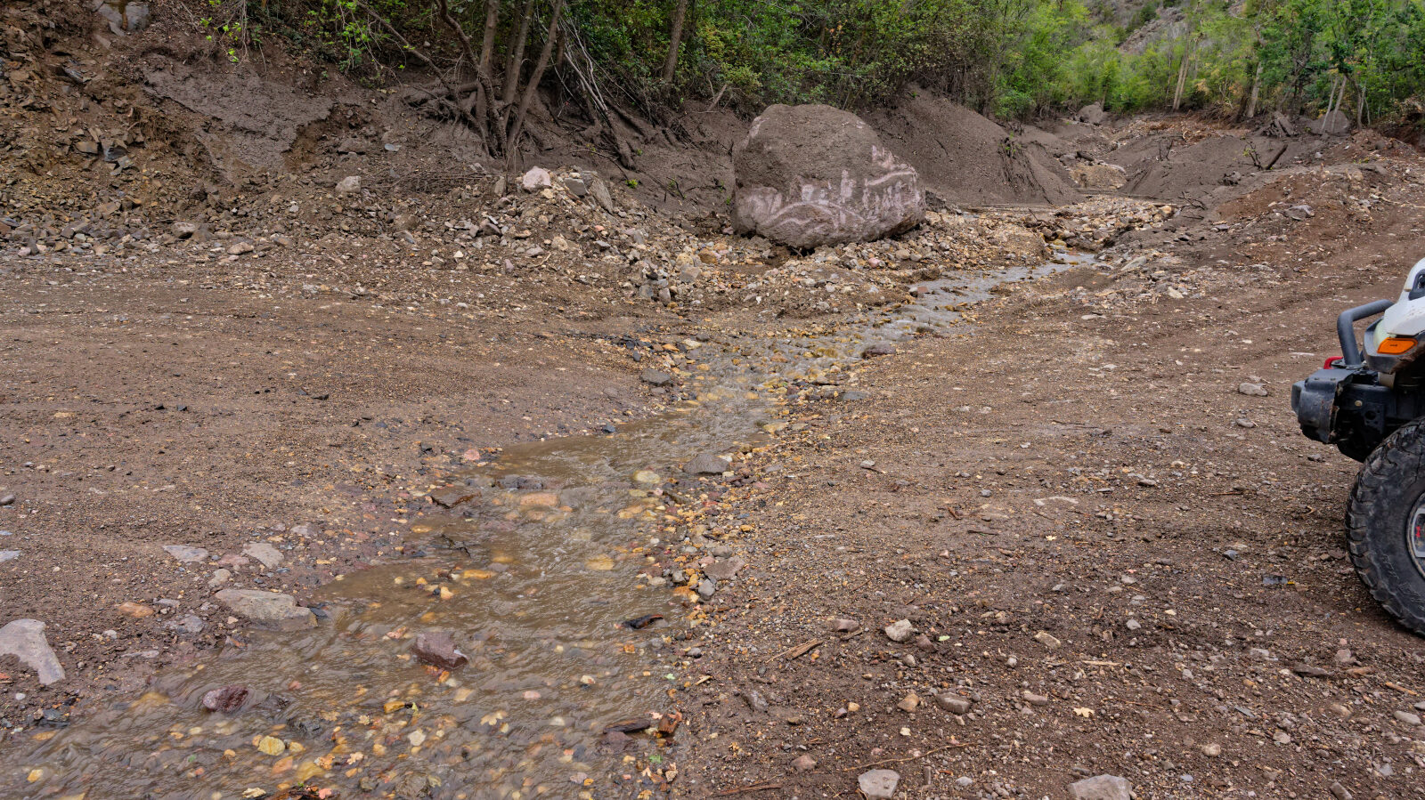Hard spot with a small creek crossing that looks washed out by past flooding. Be careful if it is raining.