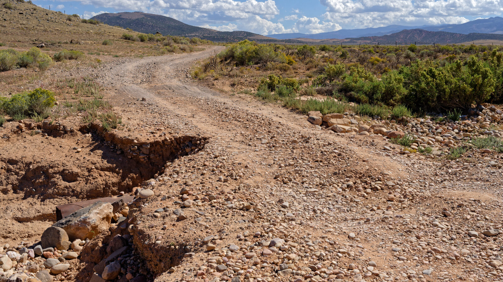 A washout in the road that looks scary but is easy. Take your time and any vehicle should get through.