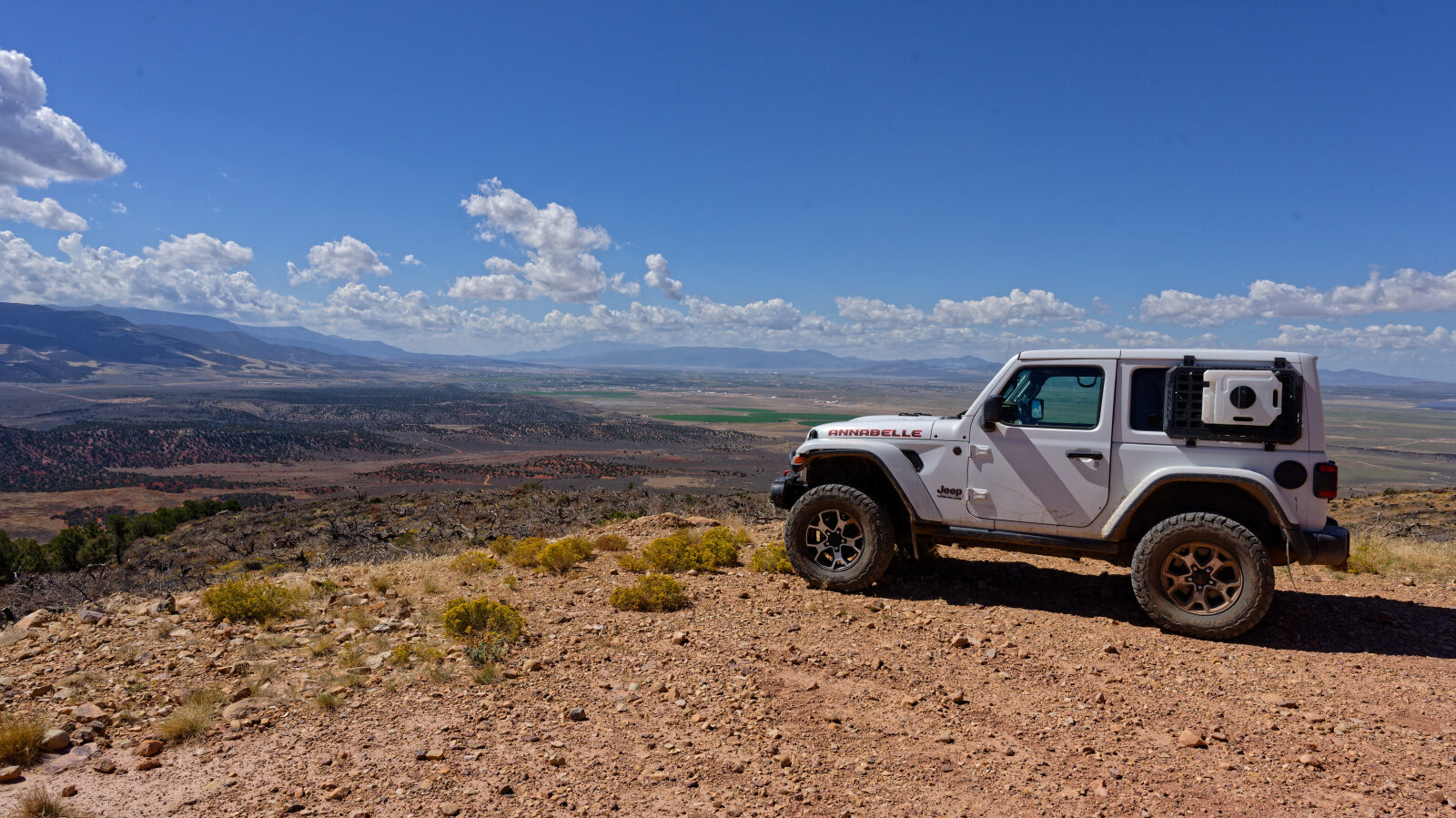The steep section is a shelf road, so watch for oncoming traffic. The top has a turnaround and a great view, usually with several Jeeps parked.