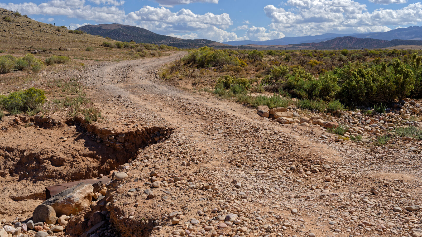 A washout in the road that looks scary but is easy. Take your time and any vehicle should get through.