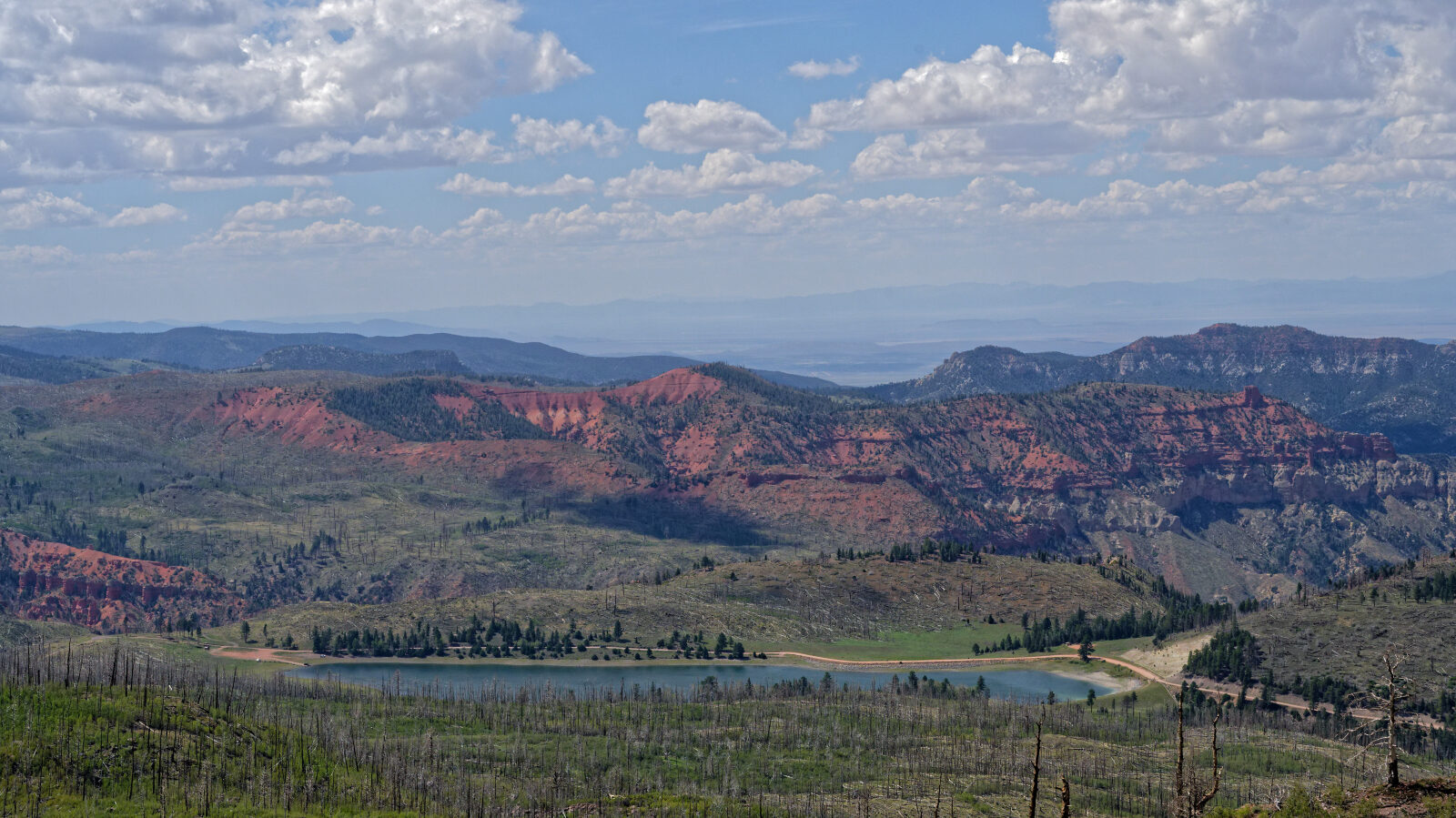 The trail ends at a 72 inch wide restricted trail with a 2,500 lb weight limit. The shale shelf road would let a heavier rig slide off. The top has views of Yankee Meadows Reservoir, Parowan Gap and the mountains in Nevada.
